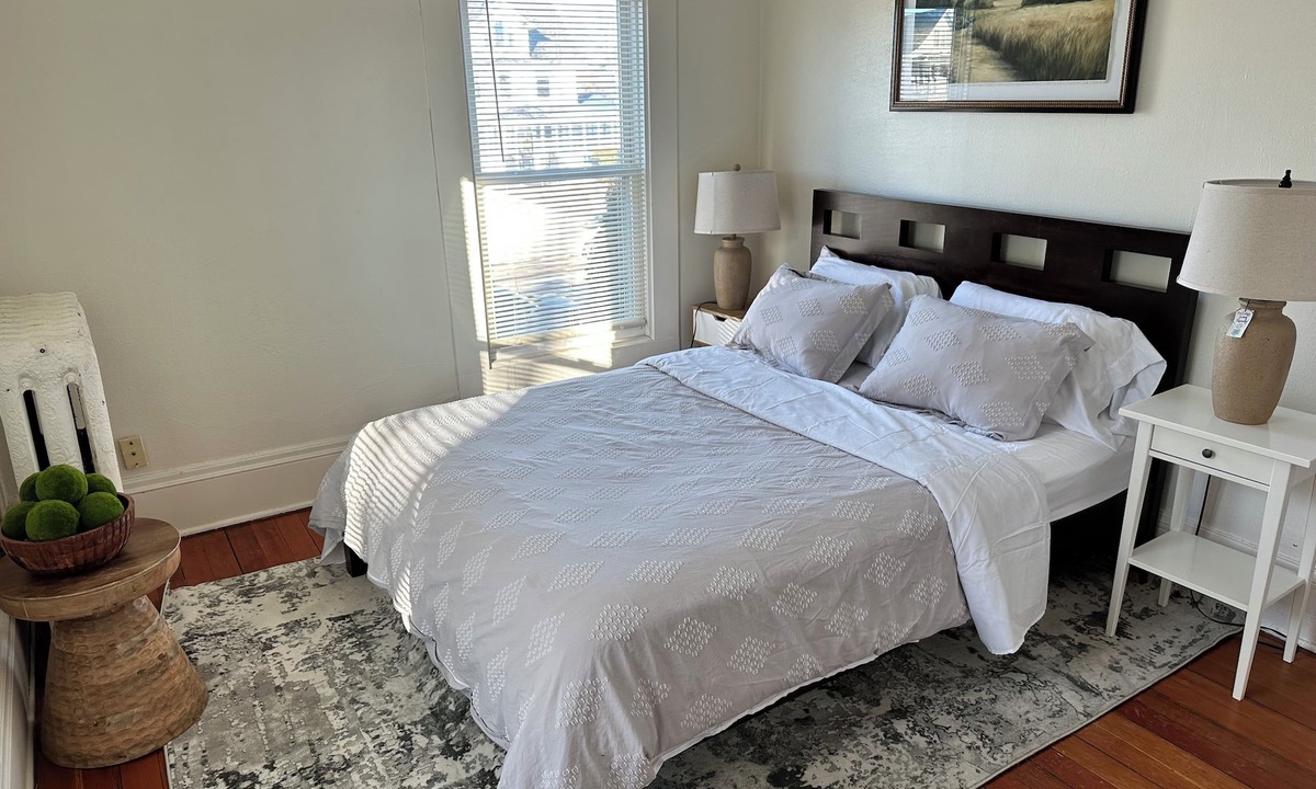 Summit - University House | Bright, cozy & cute in St. Paul by Summit-University with porch and swing chair