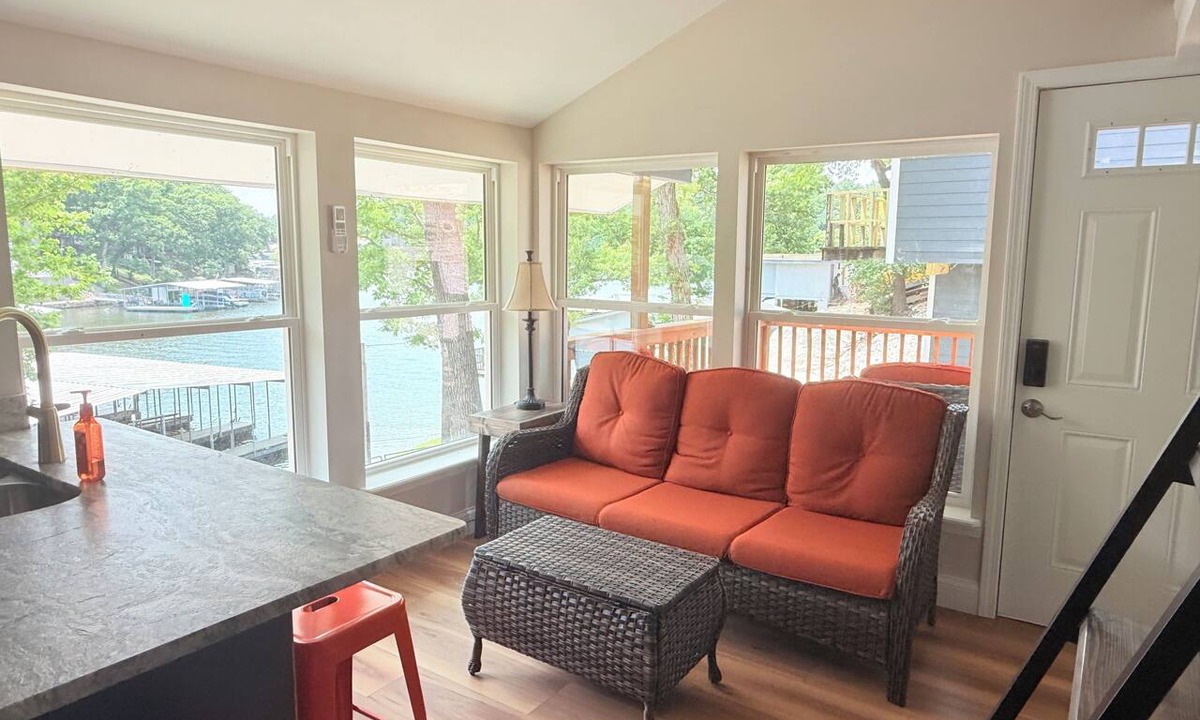 Osage Beach Cabin | Cozy 740 sq ft A-frame cabin at North Shore Resort with lake views, 1 bedroom + loft (sleeps 6), full kitchen, island seating, and a private deck—perfect for relaxing getaways at Lake of the Ozarks.