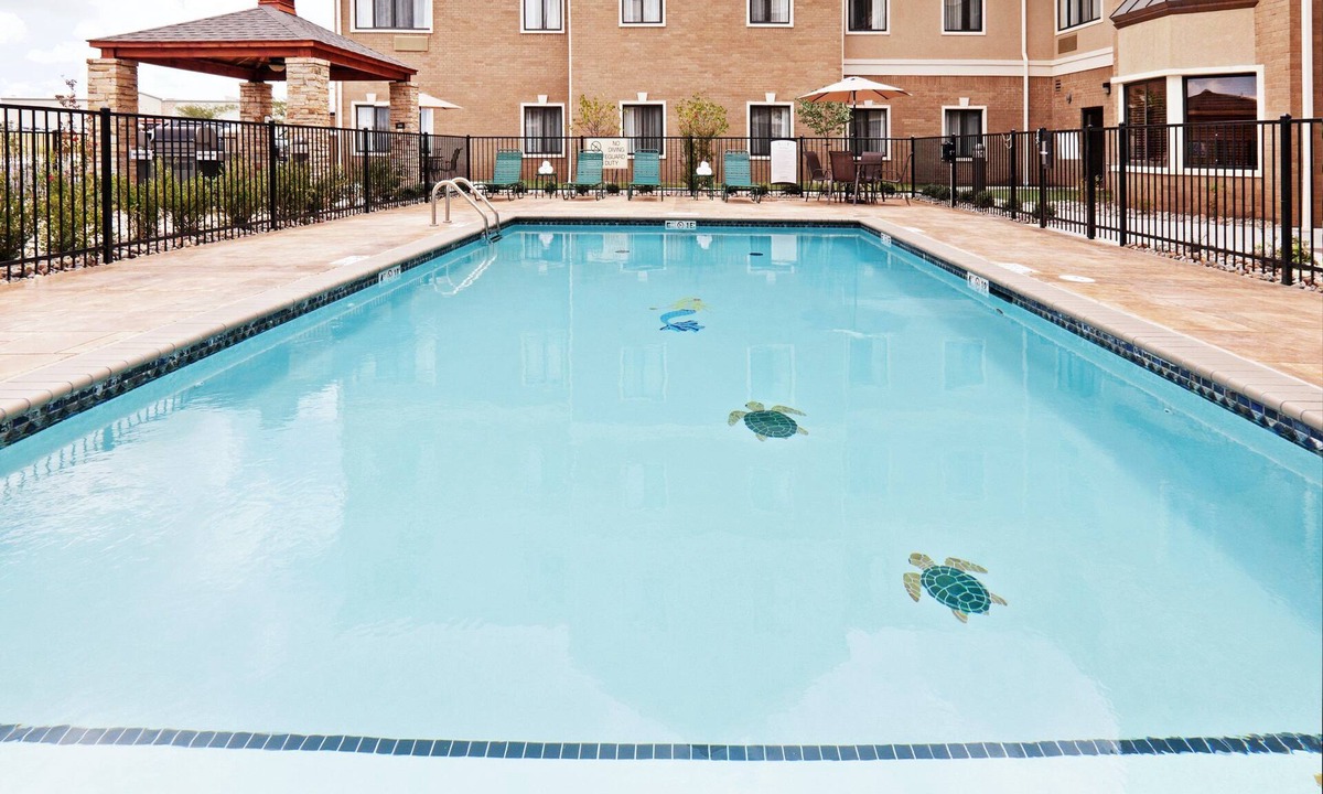 Oklahoma City Condo | King Suite. Free Breakfast. Outdoor Pool, Gym, Business Center.
