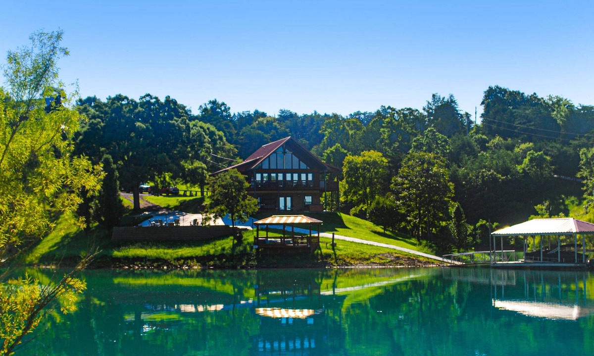 Sevierville Cabin | Lakefront cabin with views, boat ramp, dock, hot tub, & free attraction tickets