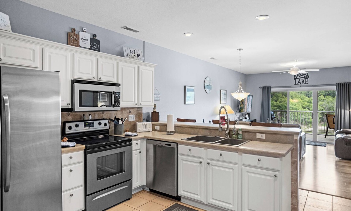 Camdenton Condo | Loch Haven 138-6E - Serene Views from the Screened Deck!