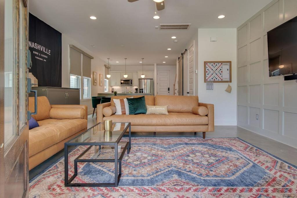 Greenwood House | Modern East Nashville Townhome Walk To Local Favorite Restaurants And Bars 2 Car Garage Smart TVs in Every Room Near Five Points The Gulch And 10 min to Broadway 24 Hr Hospitality