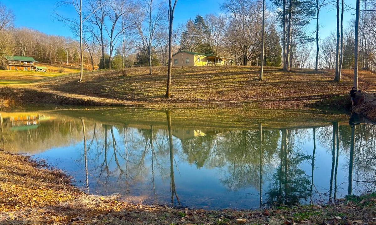 Centerville Cottage | Peaceful Hills Retreat’s cottage is clean and cozy with a creek on 97 acres