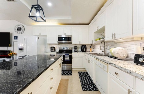 Kissimmee House | 4-bedroom home in Kissimmee, 8 mins to Silver Spurs Arena, Mecum Car Auction
