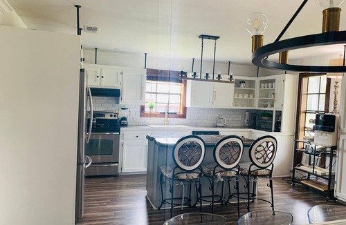 Gonzales House | Acadian Style home with a touch of modern farm house