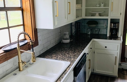 Gonzales House | Acadian Style home with a touch of modern farm house