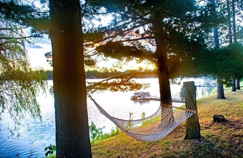 Wautoma Cabin | Beautiful Lakefront cabin woodburning fireplace, grill, canoe, SUP, AC, parking.