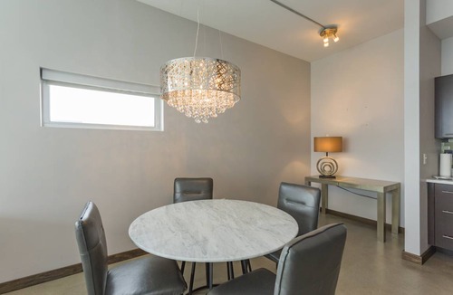 East Nashville Condo | Bright Spacious Condo 30day min w/ WiFi, AC, Parking, TV, Furnished, Rooftop