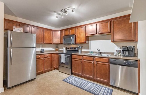 Orange Prairie Apartment | Camden 12B · ConTemporary Stay in Central Peoria