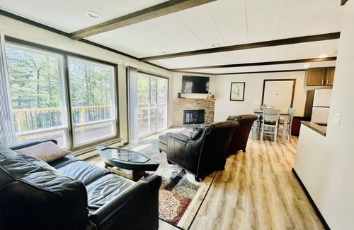 Lake Shore Estates House | Castle Rock Lakefront Home, with pier, sand bottom, and wrap around deck