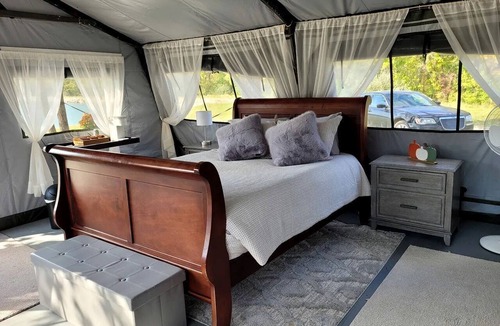 Janesville RV Rental | Comfortable, Pet Friendly Glamping Tent near Lake Charleston in Ashmore, Illinois