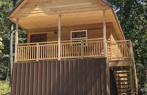 Winslow Cabin | Cowboy Cabin is a quiet place to camp in the woods with the amenities of home.