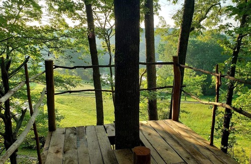 Grandview RV Rental | Cozy Treehouse Tent with Forest Trails near Waterfalls in Cumberland Plateau, TN