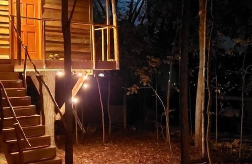 Grandview RV Rental | Cozy Treehouse Tent with Forest Trails near Waterfalls in Cumberland Plateau, TN