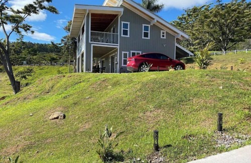 Kukuihaele Cottage | Custom cottage feels bright & airy yet cozy and private in this country setting.