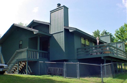 Holiday Island Condo | DECK OVERLOOKS THE PEACEFUL SERENITY OF THE LAKE