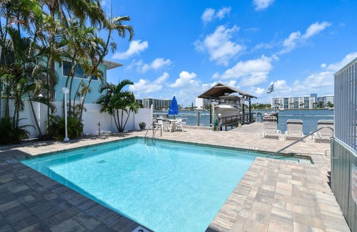 Bay Esplanade Apartment | Enchanted Inn Suite #6: Waterfront, Pool, Fishing Dock, Boat Docks & Tiki Bar!