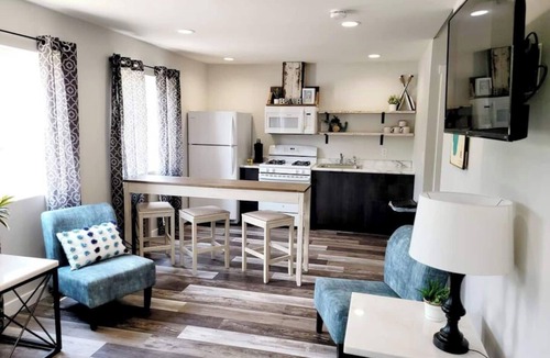 Arnolds Park Apartment | Fantastic Location-Roof Top Patio (shared) and King Bed This suite is on the 2nd level and requires guest to use stairs.