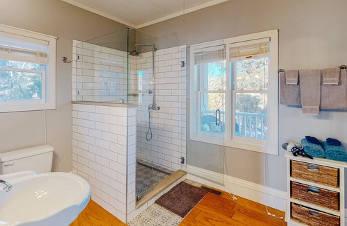 Holiday Island House | Gorgeous water view home with a fireplace, outdoor space & central AC
