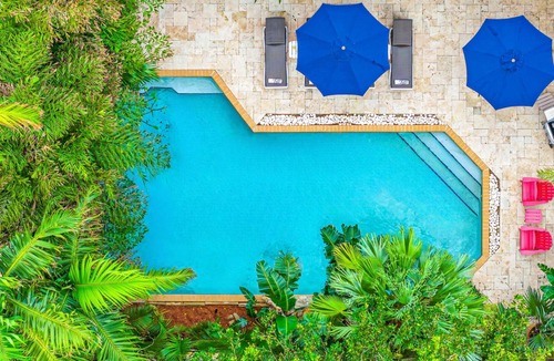 Coral Ridge House | Heated pool/Quiet Neighborhood/Family Vacation/Escape Key