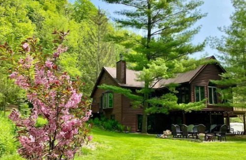 Decorah House | Hideaway Camper by the Cave & Waterfall, Kayak & Canoe Rentals, Trout Fishing