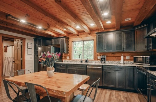 Lyndon Station House | Hot Tub, Private Log Cabin Lazy Bear Welcomes You!