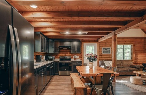 Lyndon Station House | Hot Tub, Private Log Cabin Lazy Bear Welcomes You!