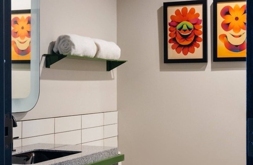 East Nashville Hotel | Immerse in Art at Trendy Guest House with Stunning Skyline Views & Rooftop Bar