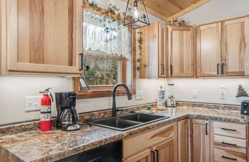 Arkdale House | Inviting home with game room, firepit, full kitchen, & W/D