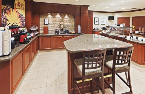 Oklahoma City Condo | King Suite. Free Breakfast. Outdoor Pool, Gym, Business Center.