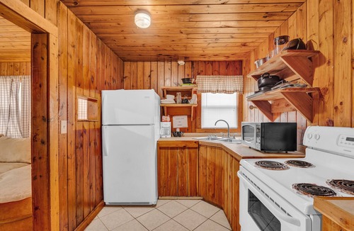 Smithville Cabin | Lake Front Lodge With a Pool and Bar & Grill