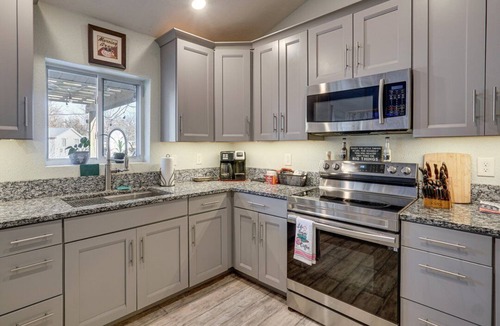 Versailles House | Lake, Sxs, Deck,Hot Tub,Dock, Kayaks,Paddle Boards, Jet Ski, & Boat Rentals