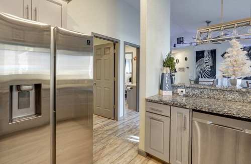 Versailles House | Lake, Sxs, Deck,Hot Tub,Dock, Kayaks,Paddle Boards, Jet Ski, & Boat Rentals