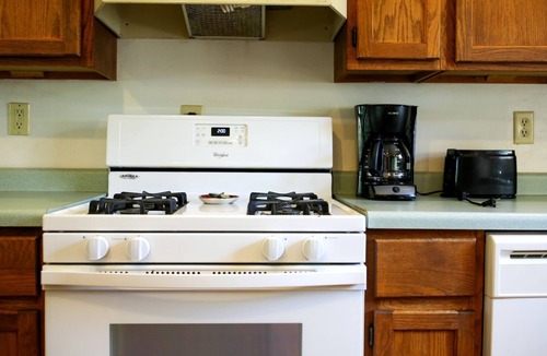Tomah House | Lakefront Cabin Rental with a Paddle Boat near Wisconsin Dells, Wisconsin