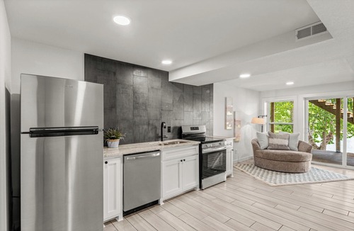 Bella Vista House | Lakefront, luxury beds, hot tub, fire pit, game room, private dock & boathouse.