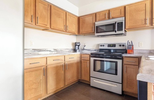 Jenks Apartment | Landing | Modern 2BD, Pool, Courtyard