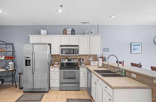 Camdenton Condo | Loch Haven 138-6E - Serene Views from the Screened Deck!