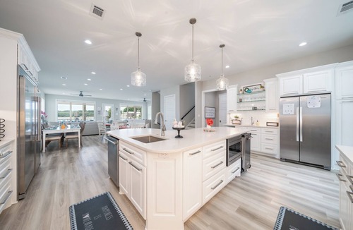 Hot Springs House | Luxe 8BR Lakefront Home, Private Pool, Hot Tub, Gameroom, Putting Green, Firepit