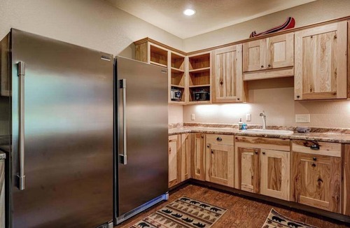 Eagle River House | Luxury lakefront home with high-speed WiFi, dock, private beach, & theater room