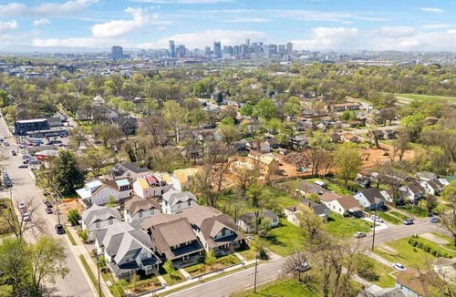 Greenwood House | Modern East Nashville Townhome Walk To Local Favorite Restaurants And Bars 2 Car Garage Smart TVs in Every Room Near Five Points The Gulch And 10 min to Broadway 24 Hr Hospitality