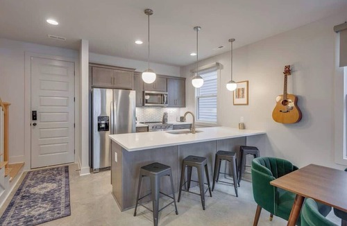 Greenwood House | Modern East Nashville Townhome with Kings & Queens | Walk to Local Restaurants & Bars | 2 Workspaces, 2-Car Garage, Smart TVs in Every Room | Near Five Points, The Gulch & 10 min to Broadway | 24 Hr Hospitality