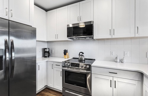 Rolling Mill Hill Condo | Muse | Contemporary downtown condo with private balcony & open layout
