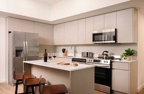 Midtown Apartment | New Executive Suite in Edgewater + Office, Balcony, Pool | Sense28 by AvantStay