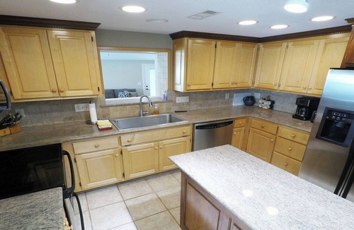 Gravois Mills House | Palm Breeze is ready for Summer. 6 Bedrooms/4.5 Baths Lake Front!