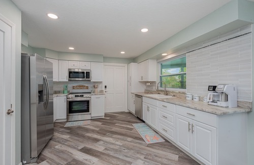 Cape Caneveral Beach Gardens House | Pool home > 1/2 miles to beach 1 mile to Port Watch Rockets take off and land