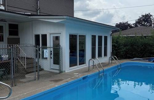 Dyersville House | Pool with 5 beds downtown