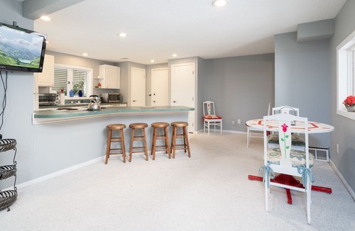 Webster House | Quaint Urban Cottage/Guest House on 3 acre wooded lot over looking a pond.