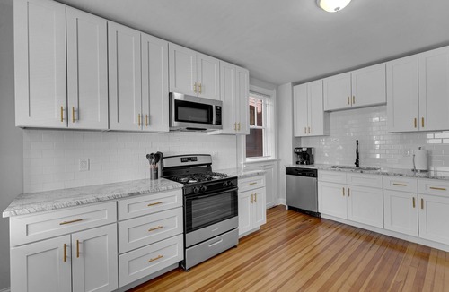 Benton Park Apartment | Relax on a private balcony with queen bed fast WiFi and full kitchen