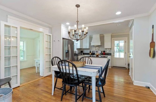 Bluefields House | Relax with the whole family at this peaceful cottage 6 miles to downtown , Opryland and other great attractions in Nashville. This home sleeps 10 comfortably it has 4 bedrooms 3 full bathrooms. Outdoor patio with a bar, hot tub, fire pit and yard