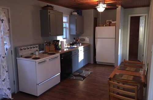 Wilburn Cabin | Riverfront Cabin on Exclusive Jon's Pocket!